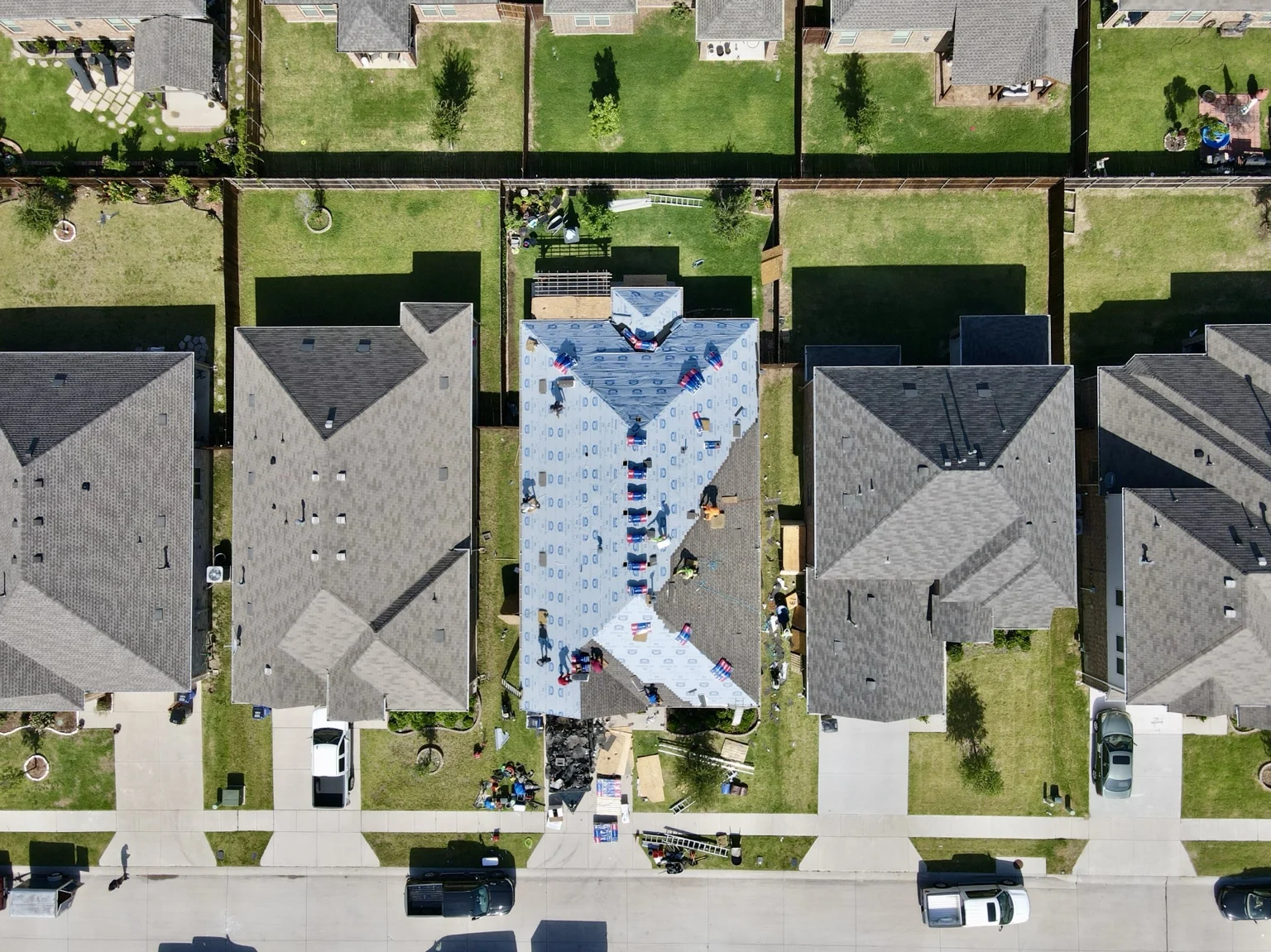Residential roofing crew at work
